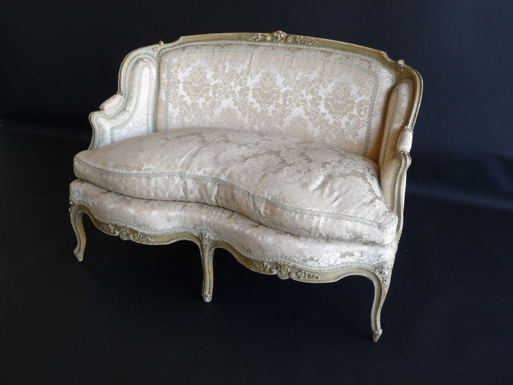 Louis XV Style Painted Canape with damask upholstery, loose seat cushion, and inset tape detail