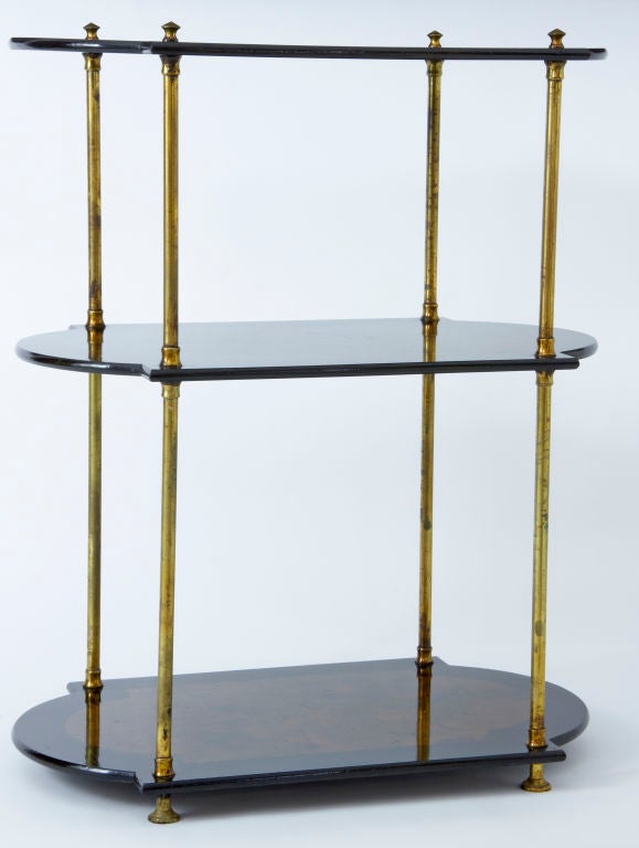 Burr walnut & ebony three tier dumb waiter with brass supports