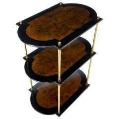 Burr walnut 
ebony three tier dumb waiter with brass supports