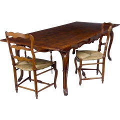 Pippy oak & fruitwood carved leg table and 8 Chairs to match