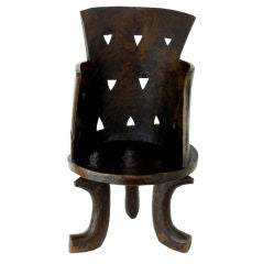 A rare 19th century ethiopian one piece dug out hardwood chair