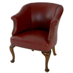 Antique Edwardian leathered tub chair on walnut cabriole legs