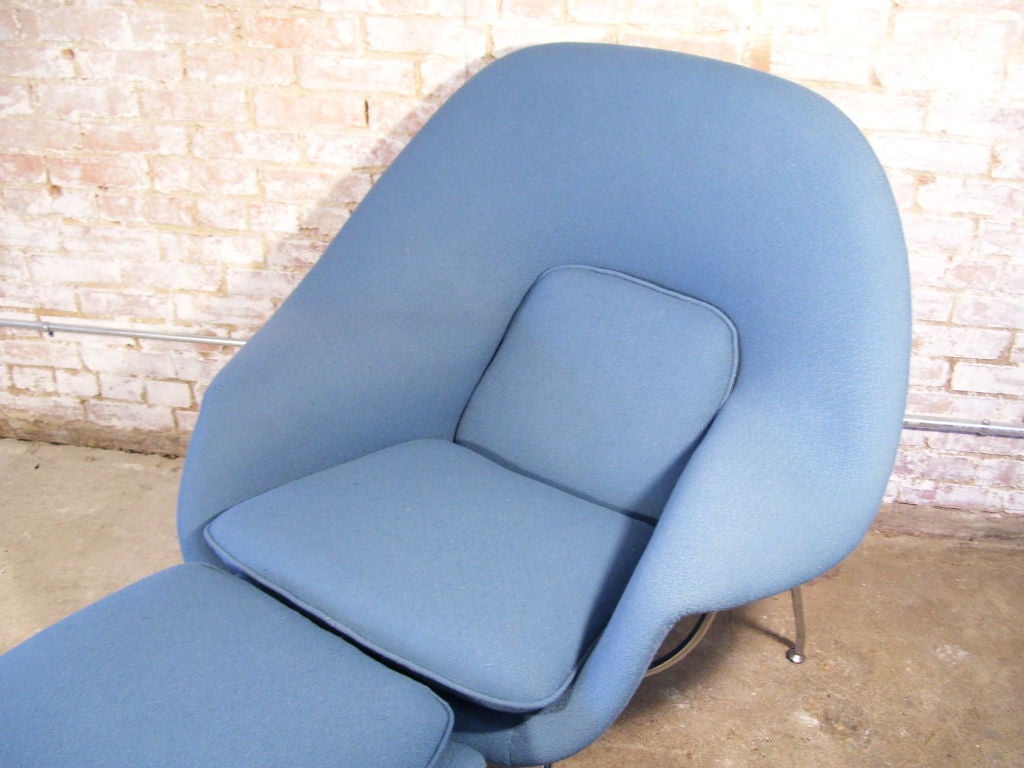 Chrome frame Womb chair recently upholstered in a periwinkle blue boucle fabric. Knoll Associates label to chair.