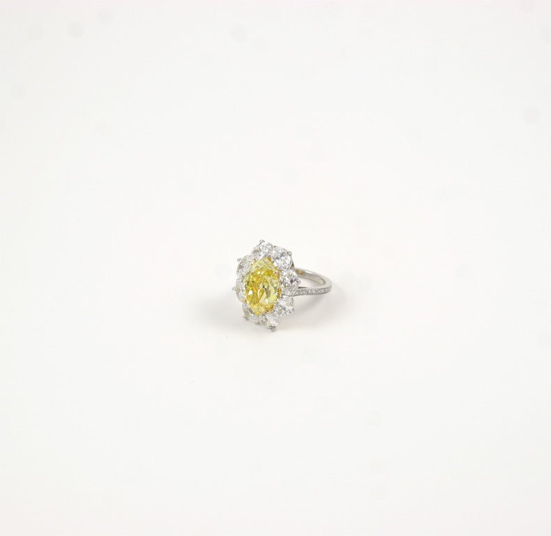 Women's Fancy Vivid Marquise Yellow Diamond Ring For Sale