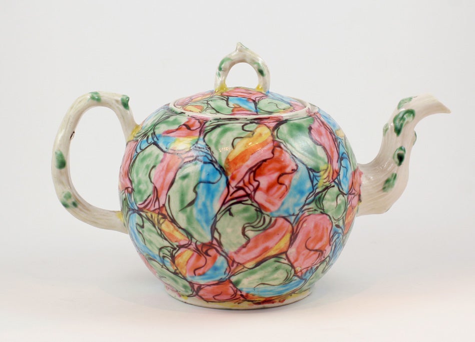 An important English saltglazed stoneware teapot painted with a marbled pattern