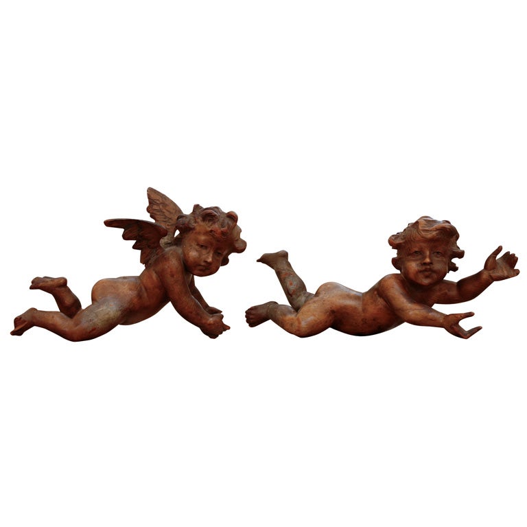 Set of three 18thC carved limewood cherubs For Sale