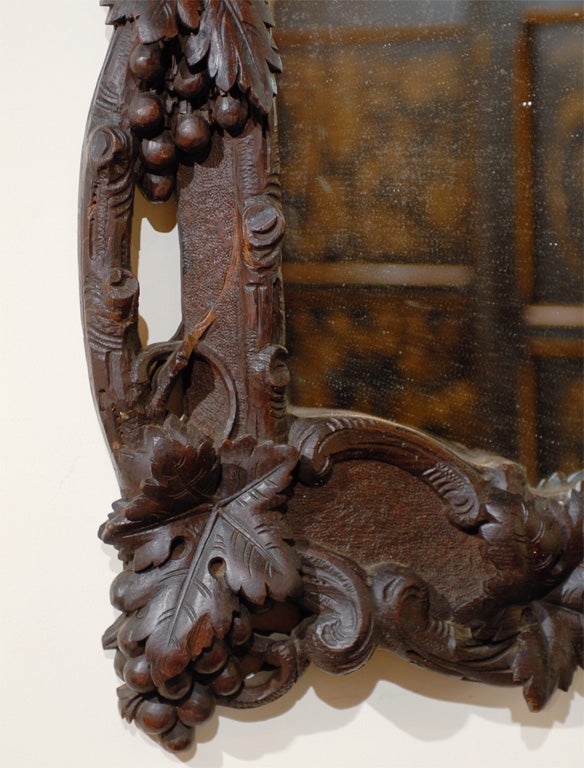 black carved mirror