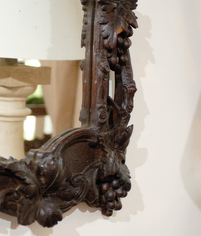 Large German Black Forest Carved Mirror with Bird Motif from the 19th Century In Good Condition For Sale In Atlanta, GA