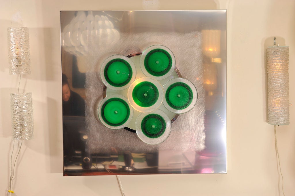 Polished nickel and green glass wall applique by Angelo Brotto