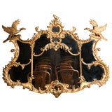 An English 19th century Chippendale designed mirror