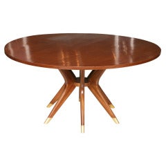 A Superb Italian Mahogany and Brass Dining/ Center Table