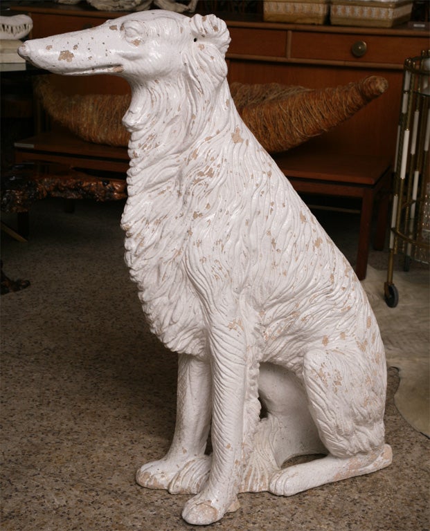 This fantastic Russian Wolfhound (Borzoi) garden statute is every bit as regal as its real-life doppelganger. Extremely heavy, this hollow hound was made in Italy from a mold-poured aggregate, then given a high gloss, baked-on, white ceramic glaze.