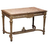 Carved wood center table with marble top