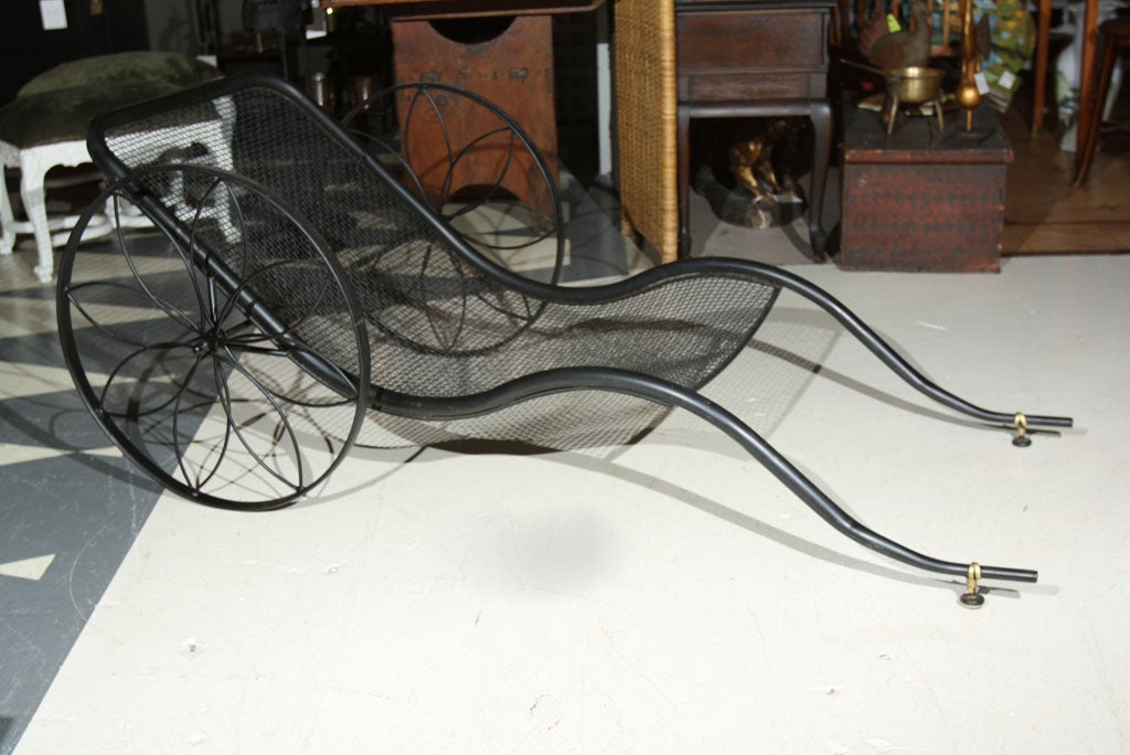 Offered here is a vintage 'rickshaw' by Woodard around 1950.  VERY RARE!  The original canopy 'roof' is black vinyl with white fringe.