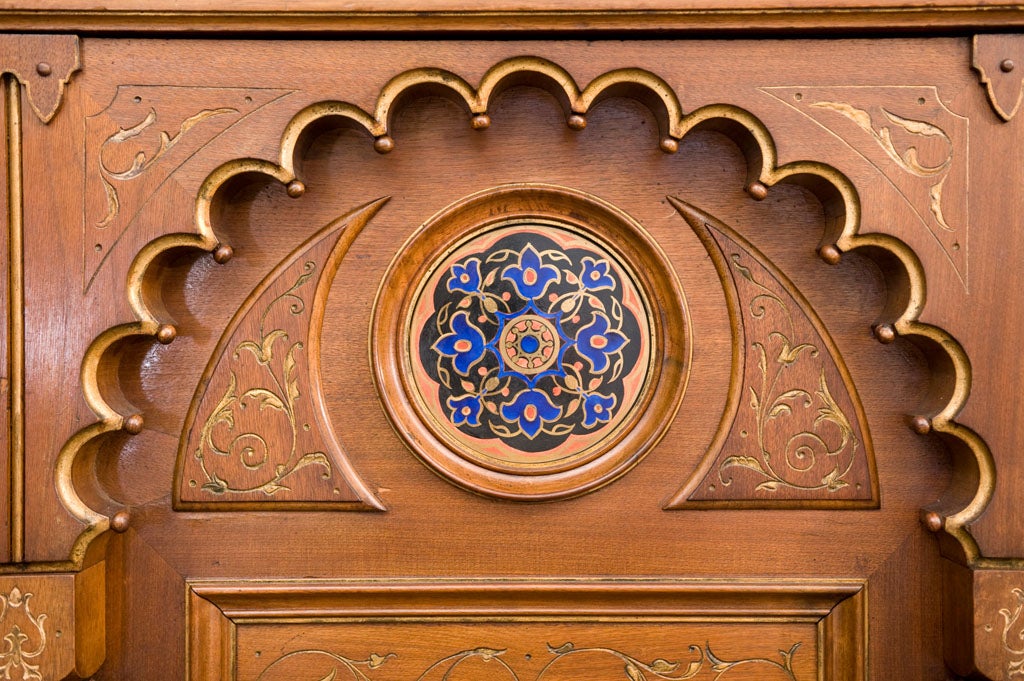 Rare orientalist influenced 7 piece bedroom suite, comprising 2 armoires, 2 beds, 2 night tables and 1 chest. The panel decoration and hardware are typical of the Aesthetic movement era.