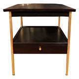 Pair of dark mahogany finish wood tables by Paul McCobb