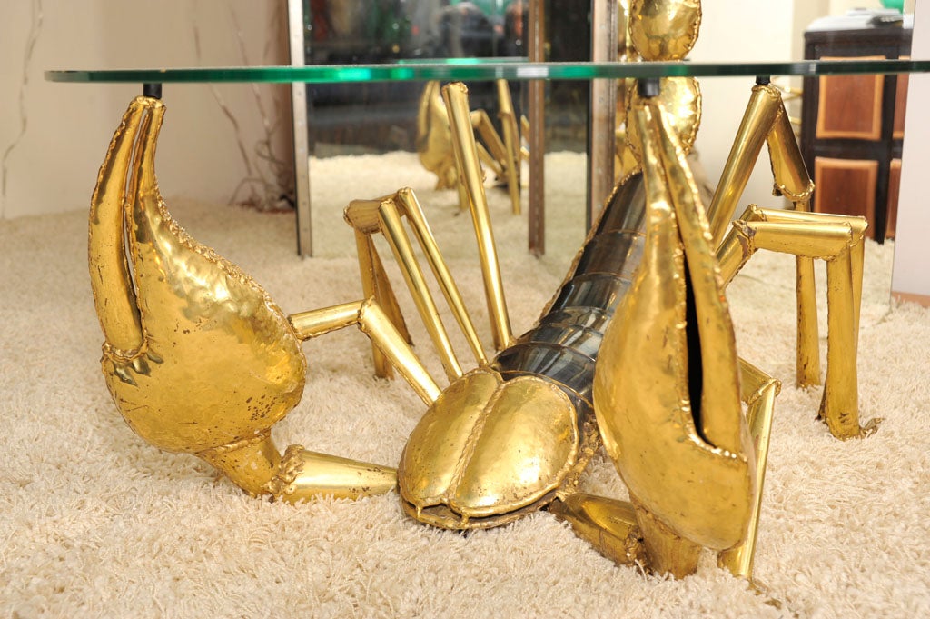 Hammered brass scorpion table with lit tail by Jacques Duval-Brasseur.