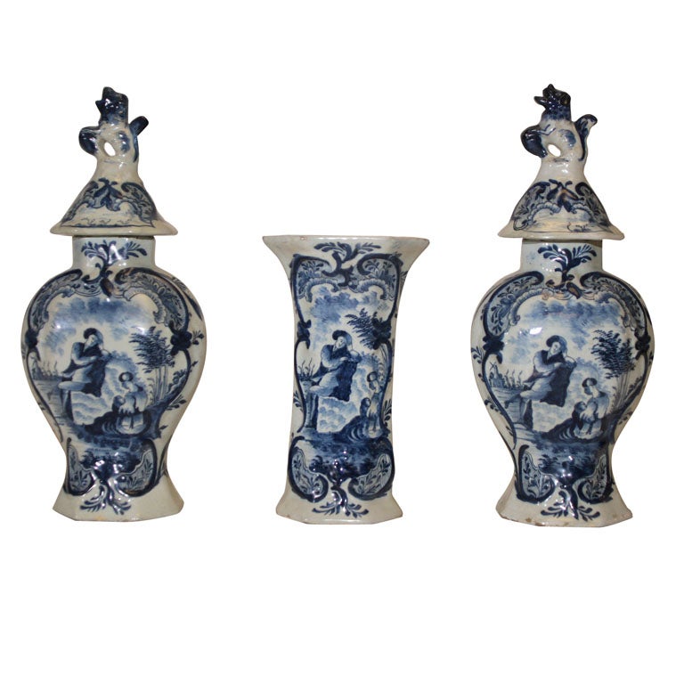 A DELFTWARE GARNITURE BY THE AXE FACTORY. DUTCH, C. 1790 For Sale