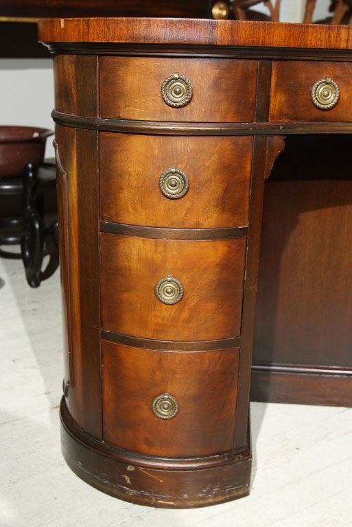 kidney shaped desk with drawers