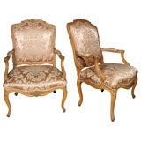 PAIR LOUIS XV STYLE CARVED  OPEN ARM CHAIRS