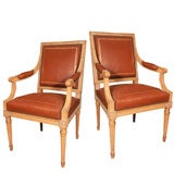 Pair of 1940's Brown Leather Bergeres with Ceruzed Finish