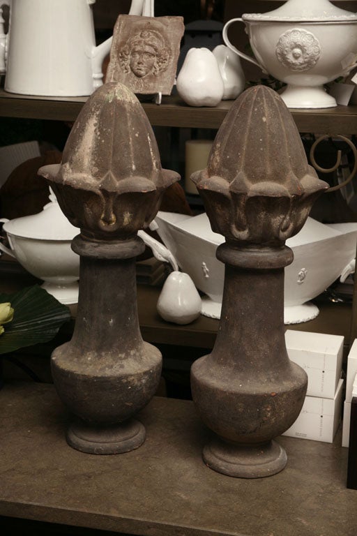 Pair of  rare terre cuite finials