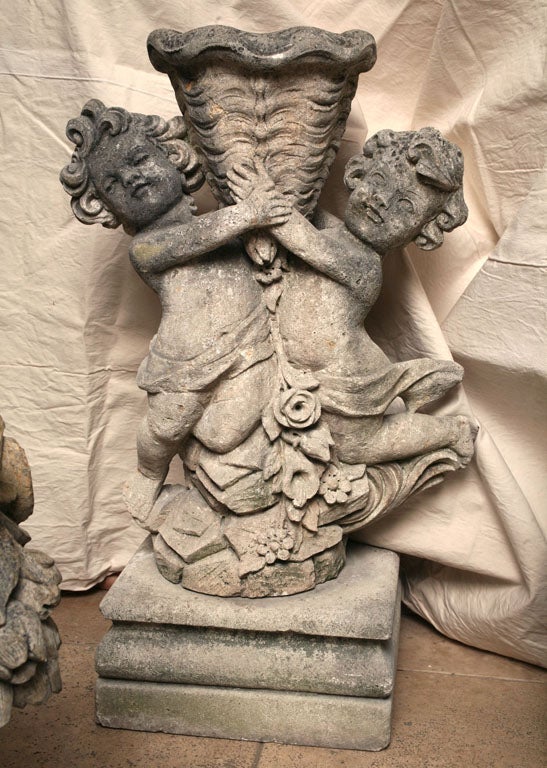 Putti holding a Cornucopia Garden Statue