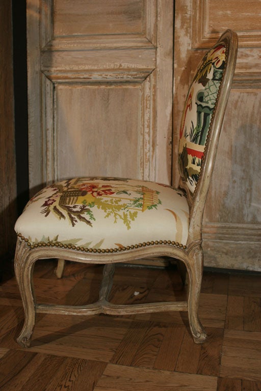 A Provencial Louis XV Style Carved and Painted Chaise 1
