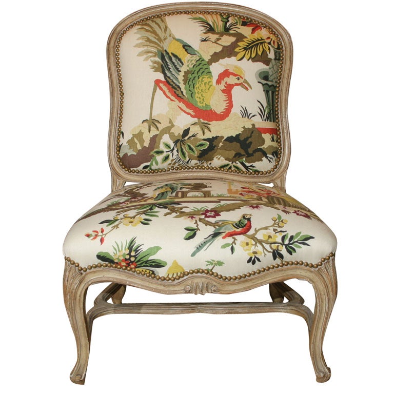 A Provencial Louis XV Style Carved and Painted Chaise