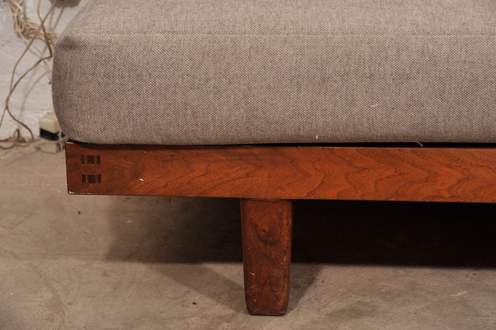 Original George Nakashima daybed with free form plank back.  Visible butterfly joint, edge, and knot details make this a truly beautiful example of his work.