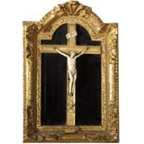 Figura enmarcada de Jesús en la Cruz