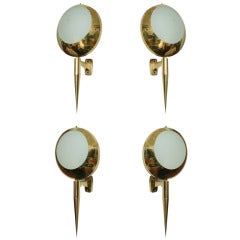 A Set Of 4 Stilnovo Brass and Frosted Glass Wall Lights