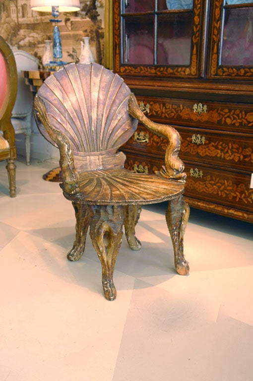 Whimsical Italian Grotto Armchair,<br />
with shell form back and seat,<br />
dolphin form arms,<br />
and seaform legs