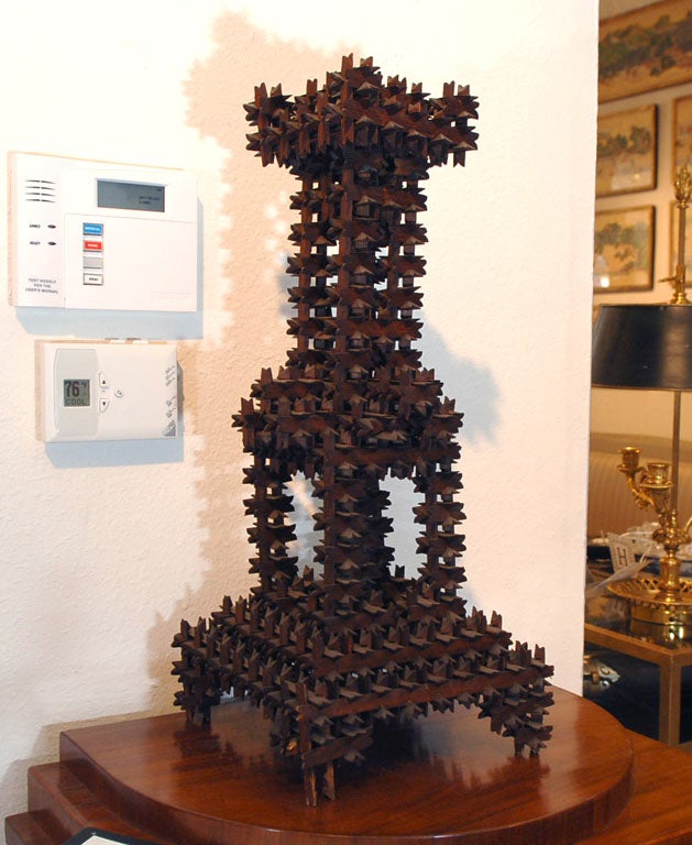 Wonderful Wooden Decorative Tramp/Outsider Art Sculpture,<br />
In the form of an architectural tower,<br />
made of 100's of interlocking pieces of hand-carved wood,<br />
without the use of glue