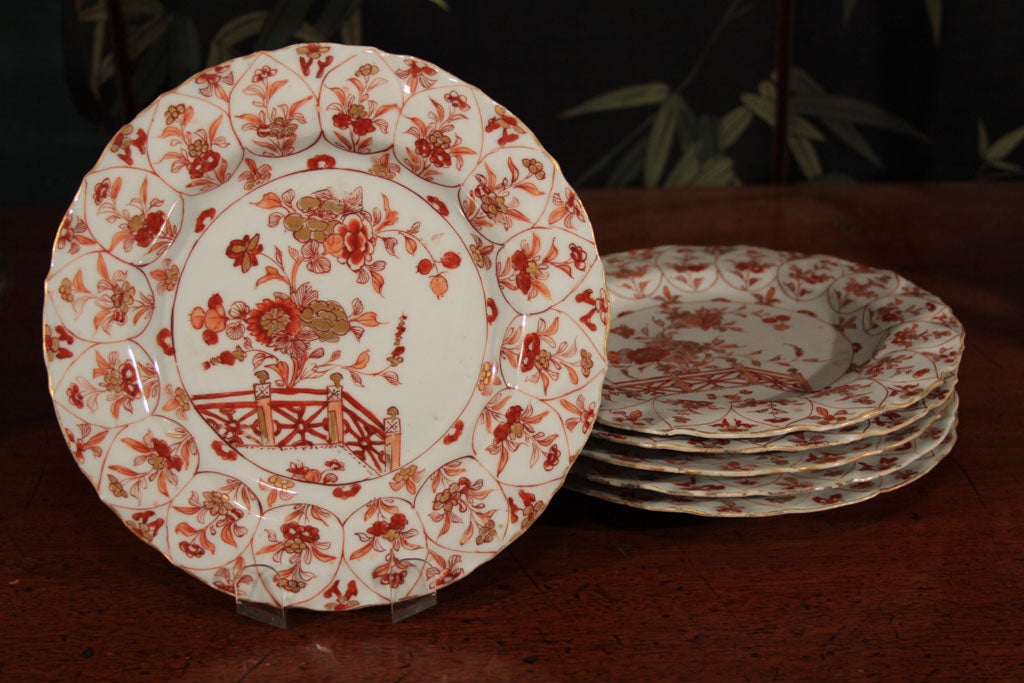 Set of six antique chinese plates. The plates are dating back to the 18th century of the Kang Hsi period. They are decorated in soft reds on a white body. They have no marks.