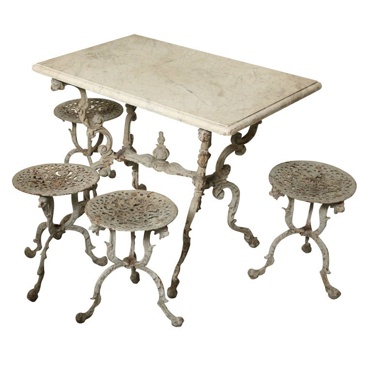 Suite of Grey Painted Cast Iron Table and Four Tabourets