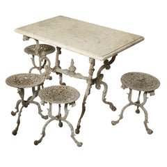 Antique Suite of Grey Painted Cast Iron Table and Four Tabourets
