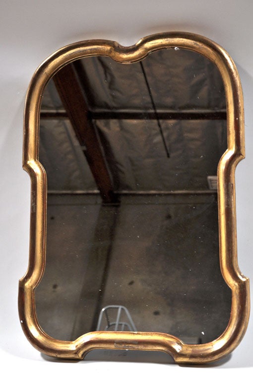 Mid-century gold mirror. 