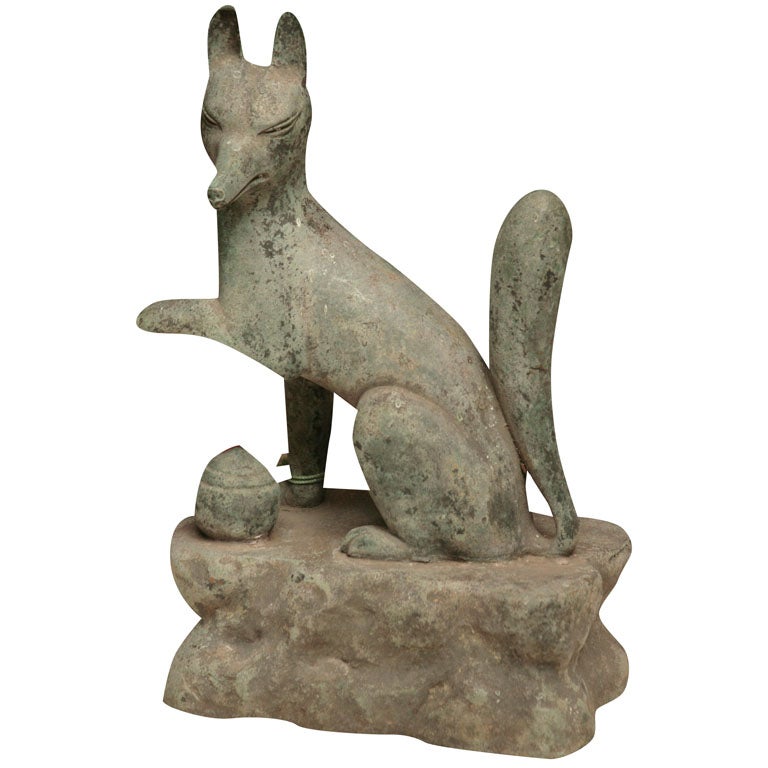 Japanese bronze fox ( Inari) a guardian figure.