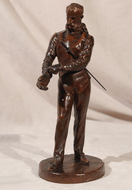 This beautiful study of a young gentleman about to engage in a fencing duel exhibits the highest quality in bronze sculpture. Note the quality and detail to his moustache and even his eyes as he is about to engage in a fencing match.

Benoit