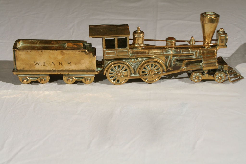 Very heavy (approx 10 lb) Steam locomotive and coal car in solid brass. Engine has 