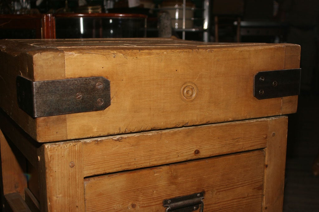 Drawer is accessible on both sides of the butcher block. 