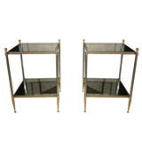 A Pair of Two Tiered Silver and Gilt Brass Etagere Tables