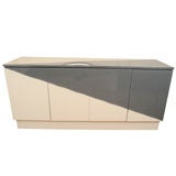 Gray and white lucite veneer sideboard with geometric motif