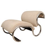 Pair of upholstered tubular chrome "S" chairs