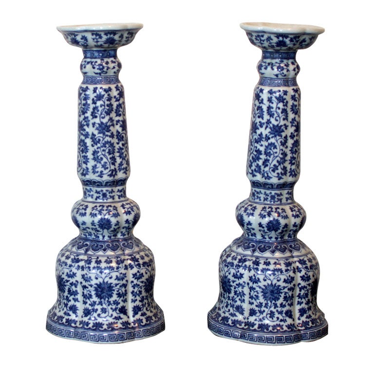 A Pair of Tall China Candlesticks