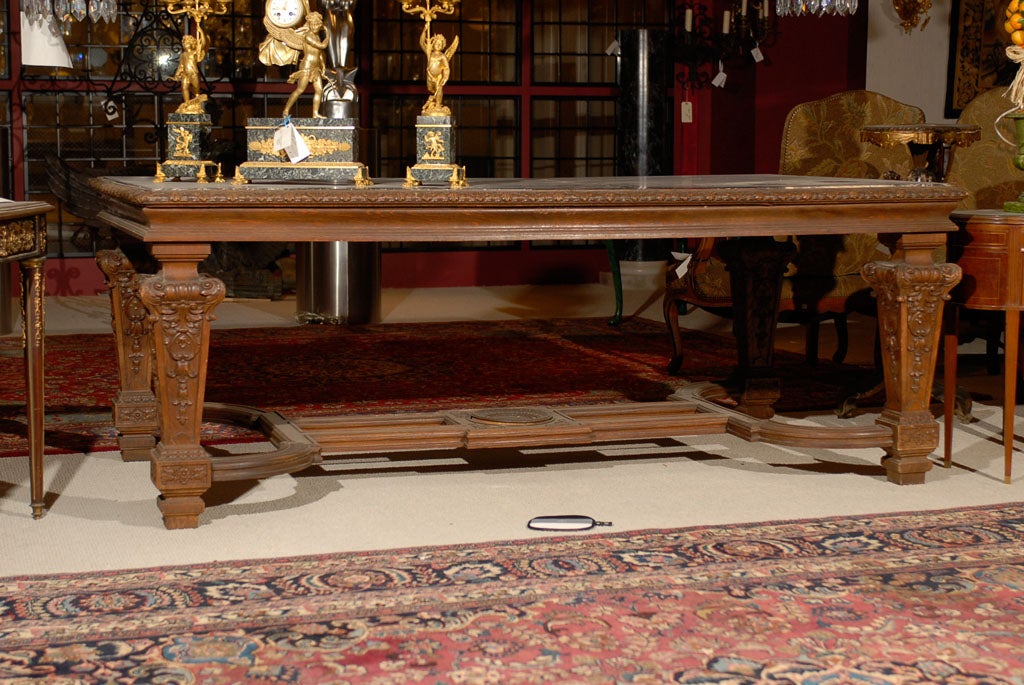 Superb exquisitely carved Regence style table with incredible stretcher and marble top