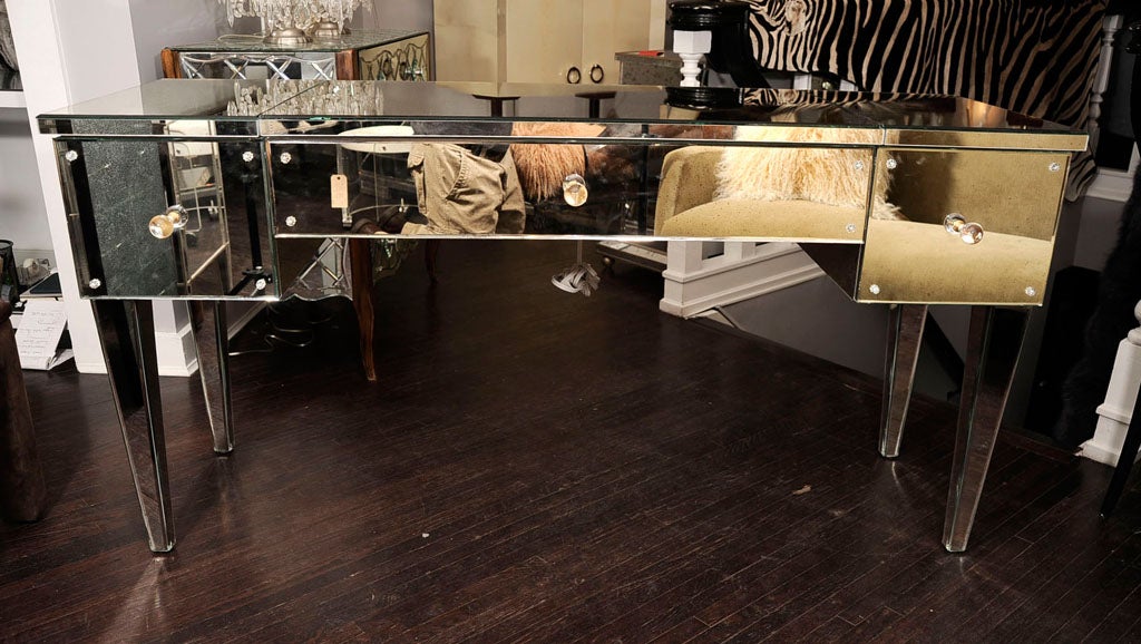 Mirrored flip-top vanity desk with three drawers. Customization is available in different sizes, finish and hardware.