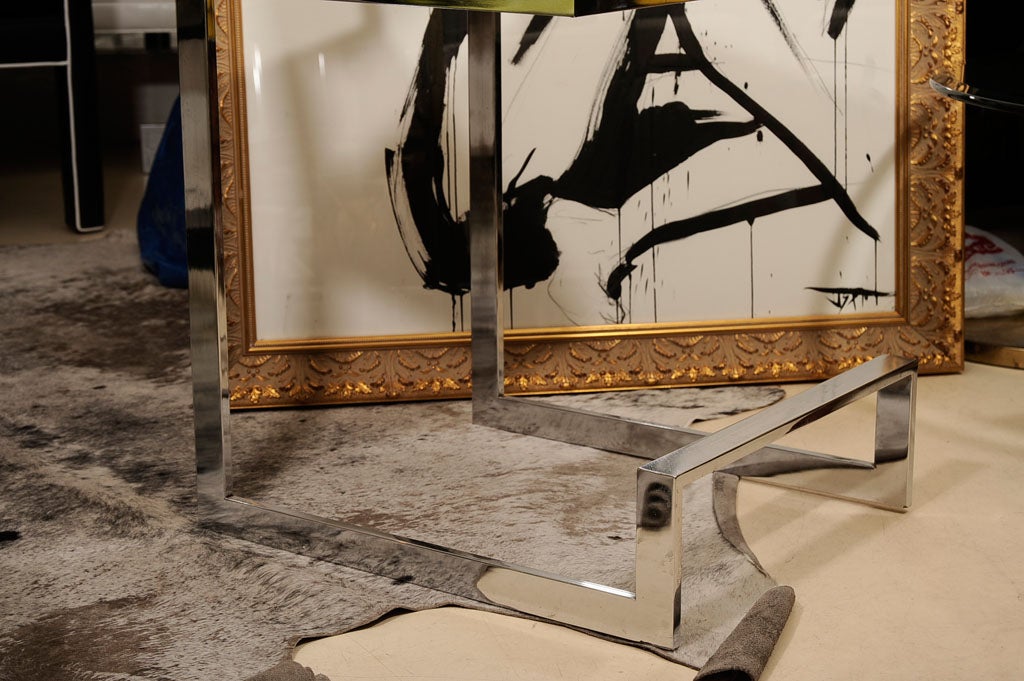 Chrome bar stool from the 1960's with white ultra leather(faux leather).