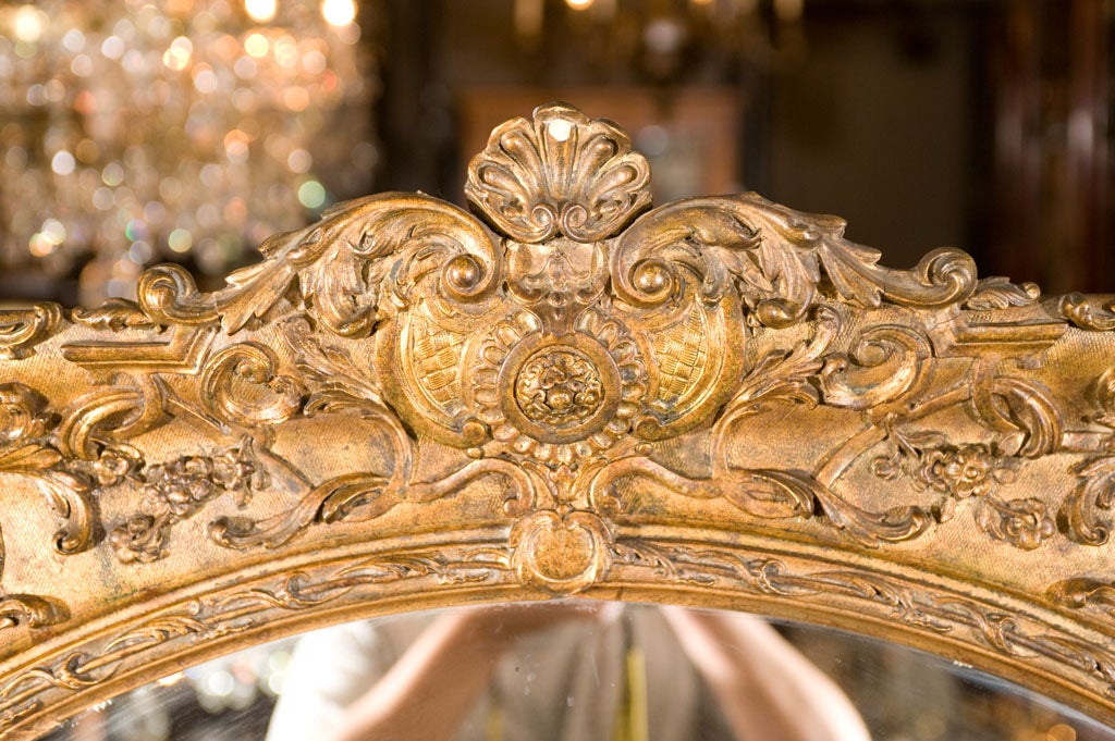 Beautifully carved and gilt mirror.